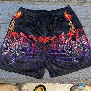 Men's Black Graphic Athletic Shorts with Red & Purple Flame Design